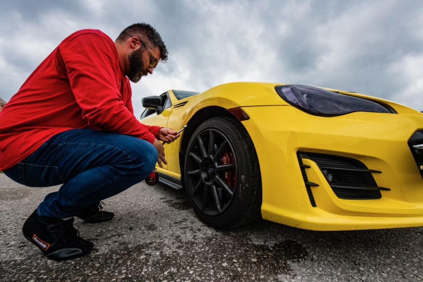 Dale preparing the yellow BRZ at the track